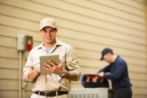 installers-working-on-a-new-outdoor-unit